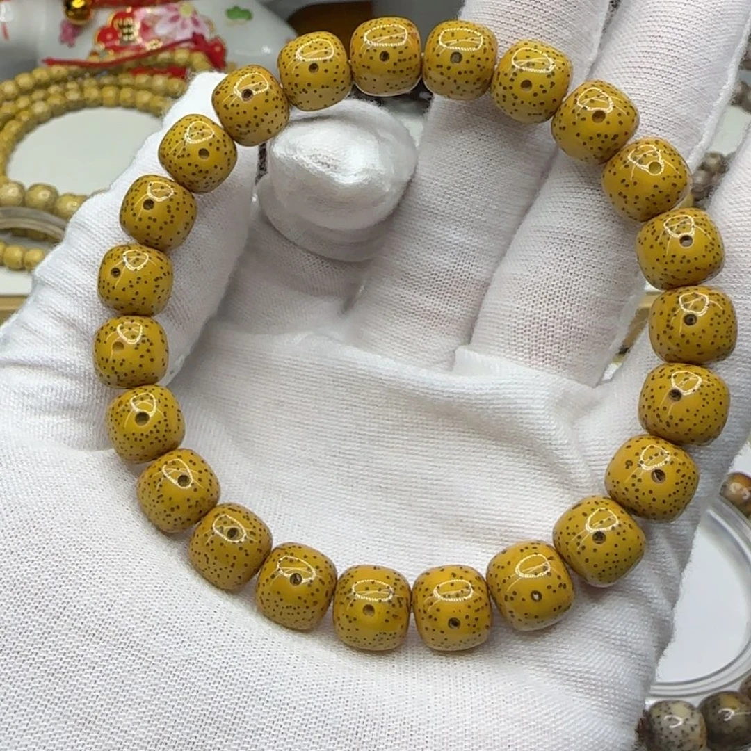 手串星月菩提鸡油黄10×9同枝果