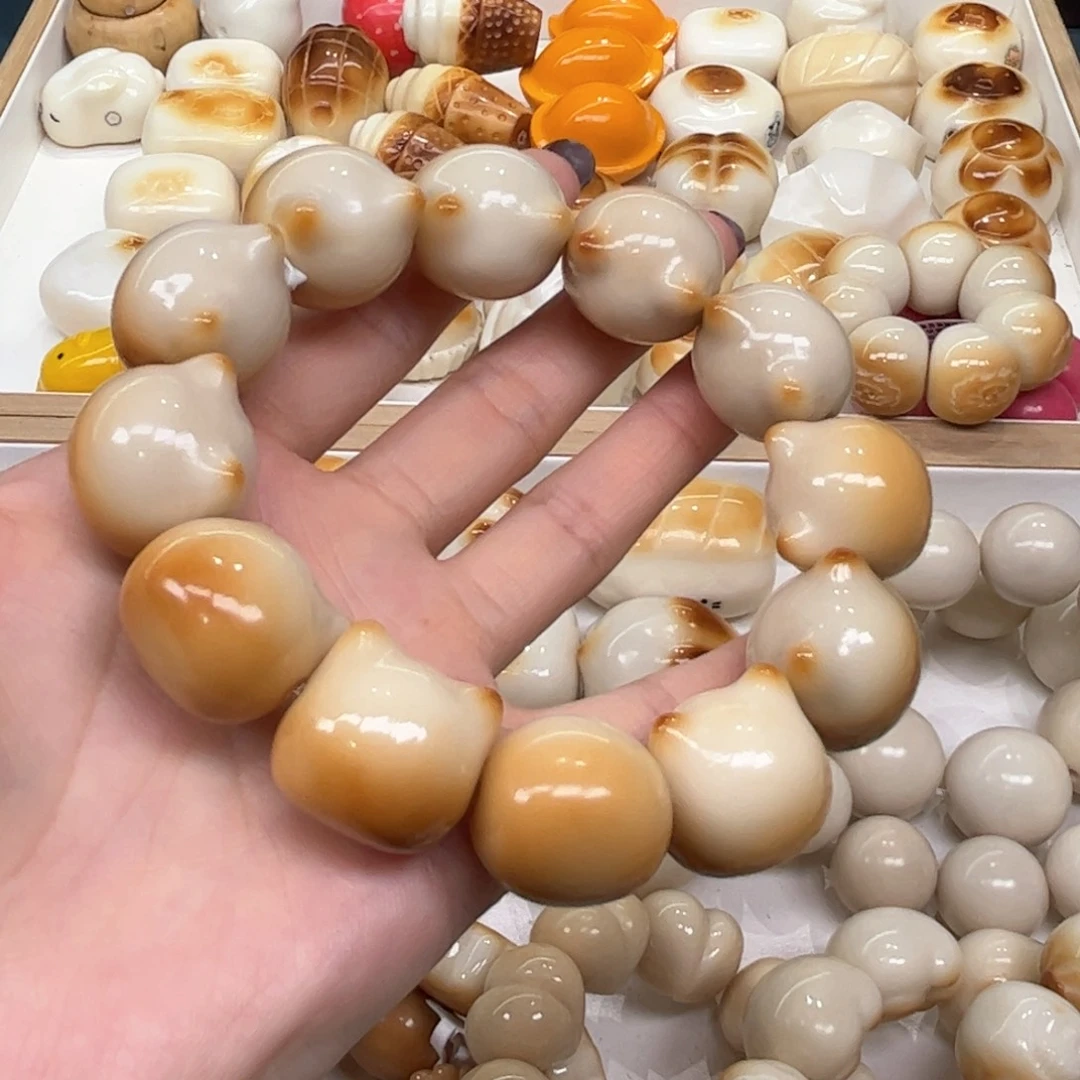 手串菩提根/象牙果9.17.30象牙果渐变猫头微瑕