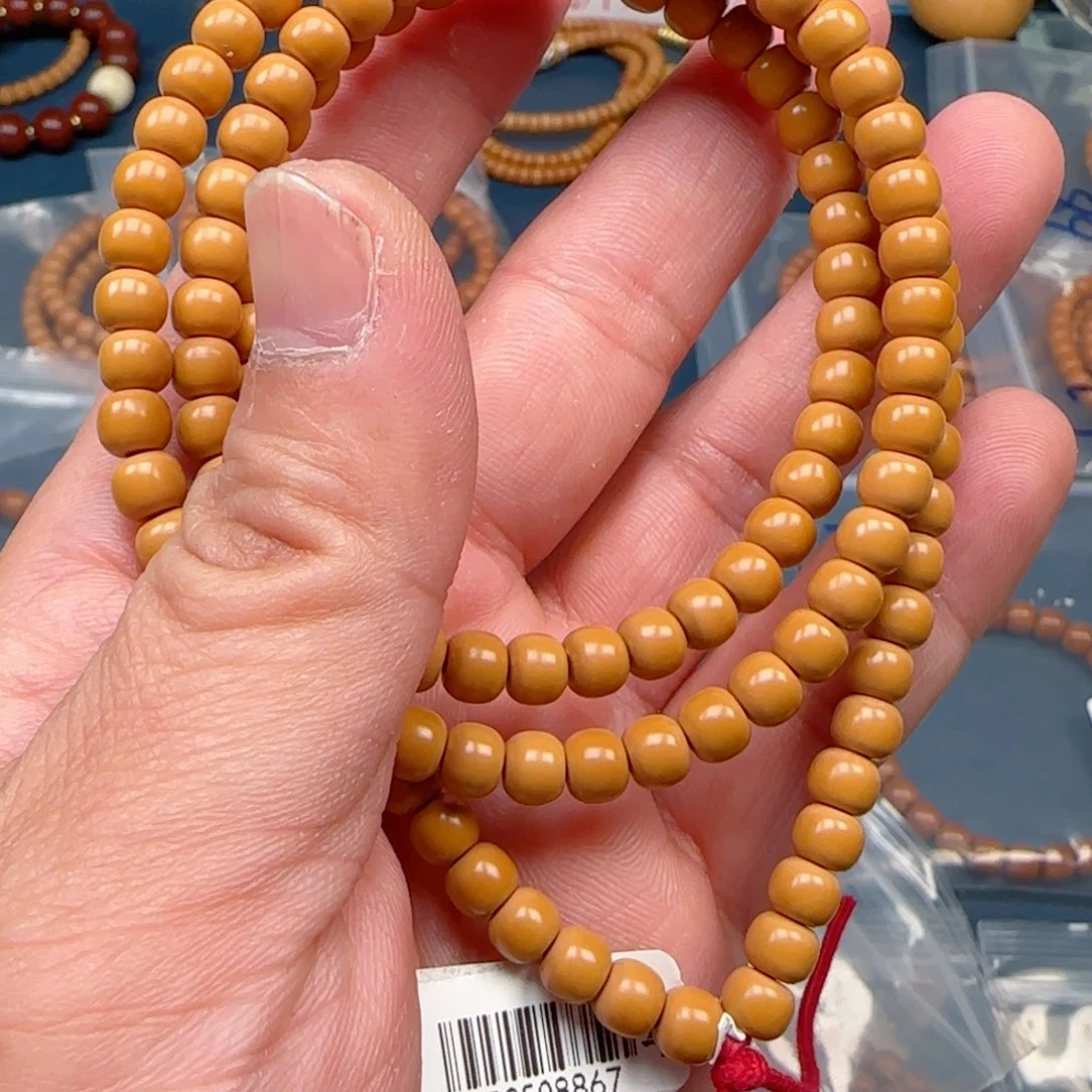 烛***️橄榄核手串老挝SSS级核尖极限弧尺寸6.2×120颗全无白