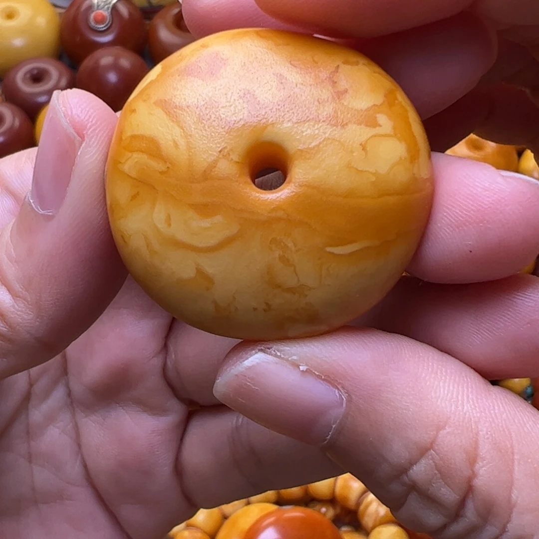 晓***蓉裸石蜜蜡未镶嵌扣子