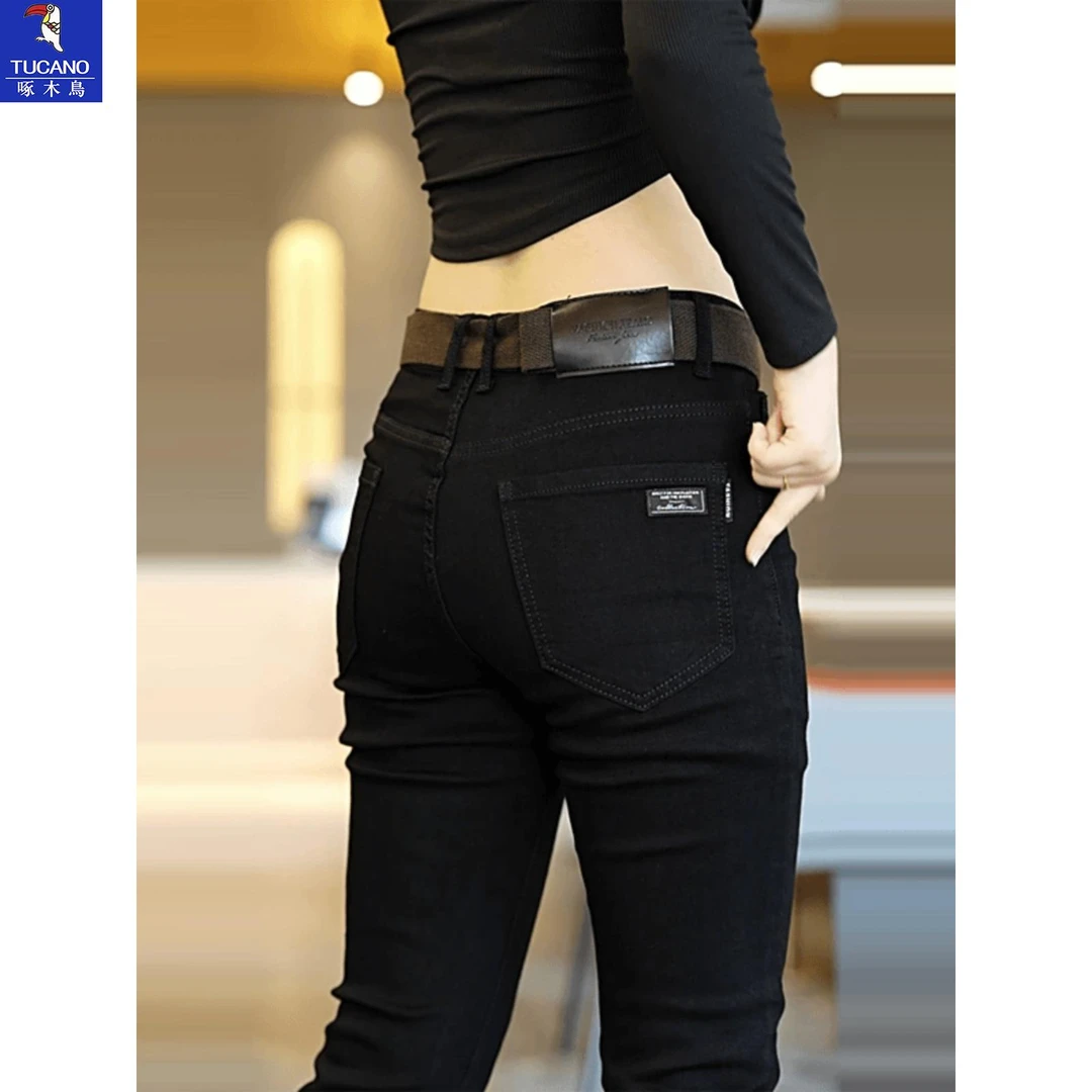 啄木鸟高端纯黑男士牛仔裤2025冬季修身直筒潮牌秋冬加绒休闲长裤
