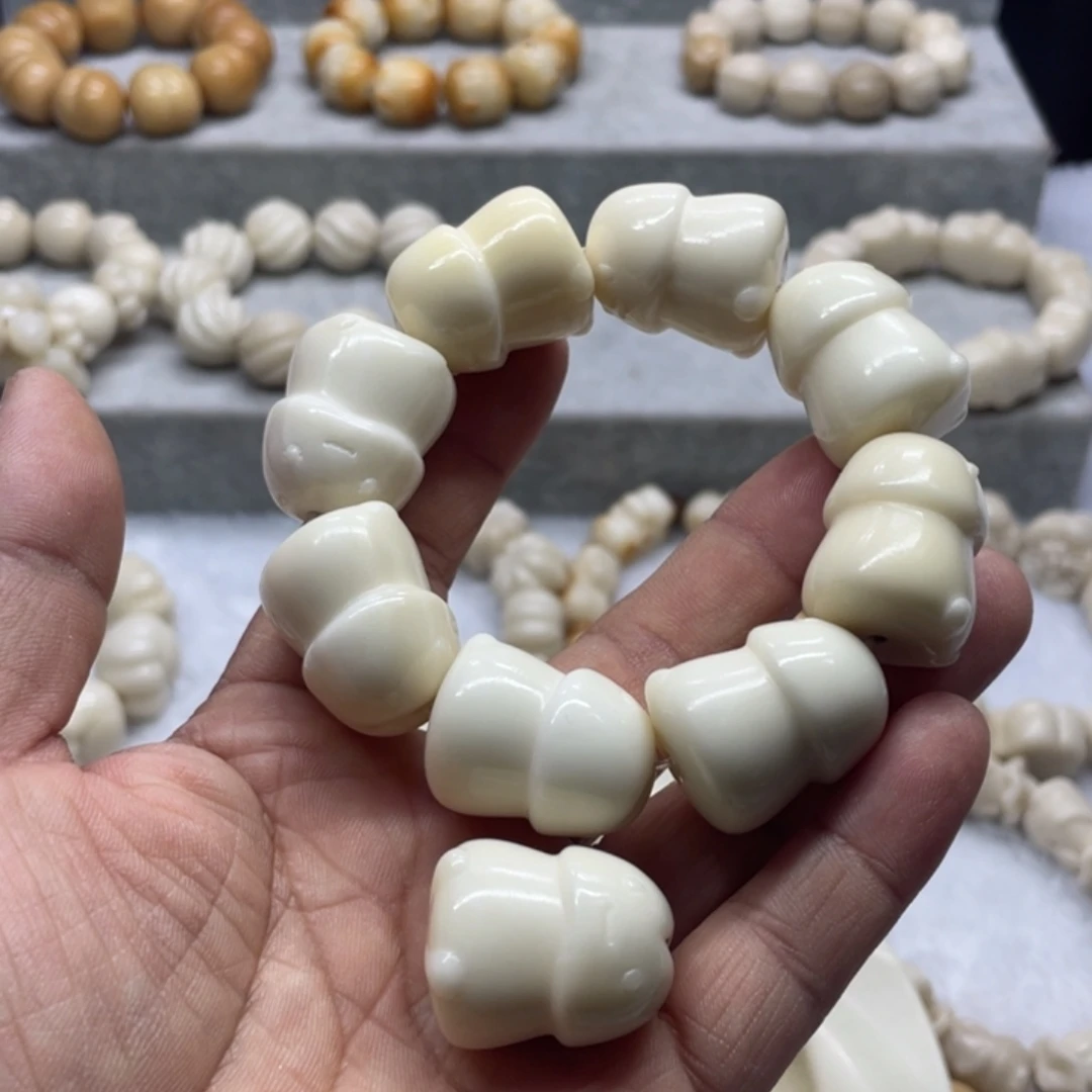 吊坠菩提根/象牙果全品象牙果丁丁手串卡26
