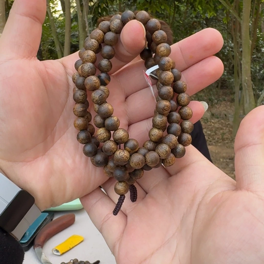 沉香沉香碎屑莱****?棋楠沉香串乌身圆叶多圈08*26+