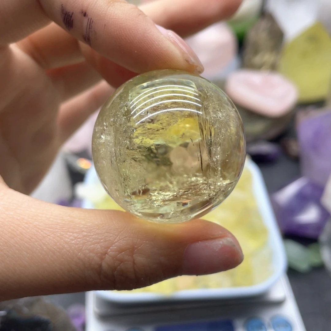 34未镶嵌水晶奶***?黄水晶球