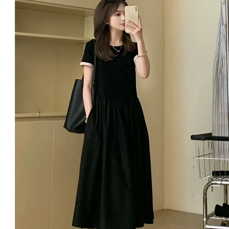撞色拼接收腰显瘦连衣裙女2025夏季新款设计感时尚减龄黑色中长裙