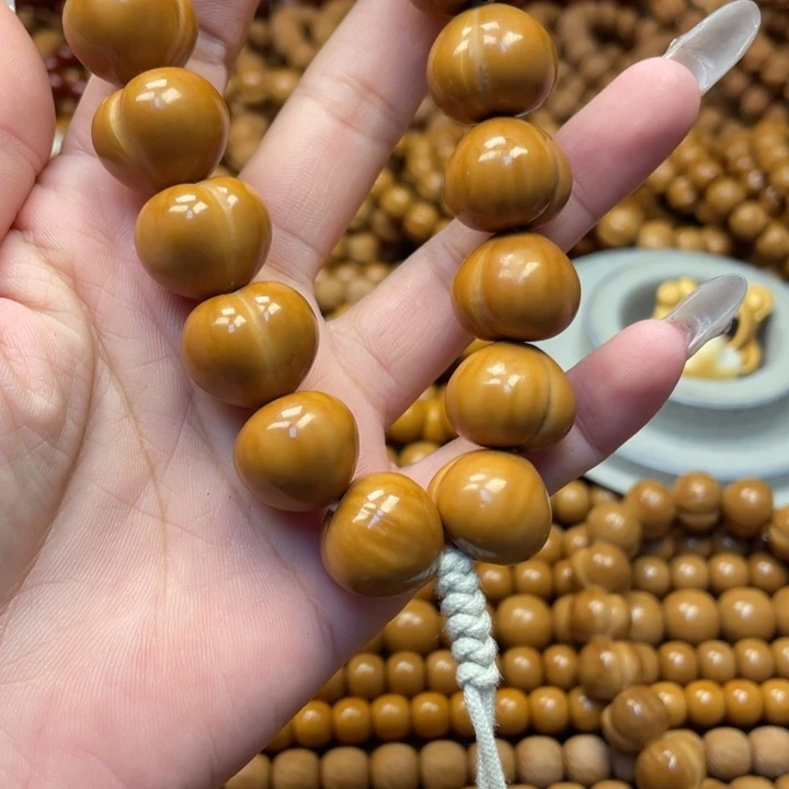 卿***河核桃全品亮面大屁桃手持