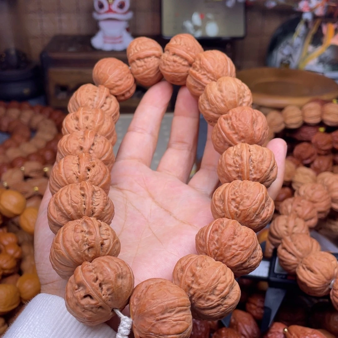 成***，文玩核桃吊坠秋子