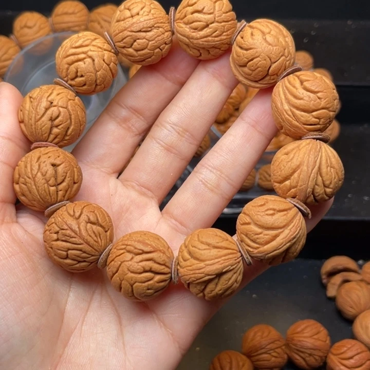 桃核手串金丝龙珠22