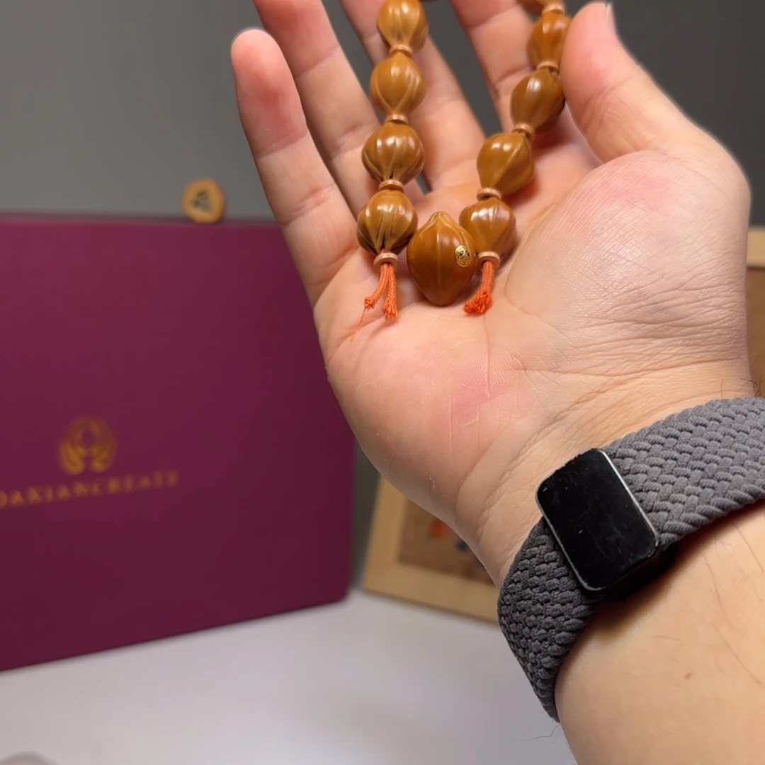 随***）橄榄核手串梅林铁核14-18四花