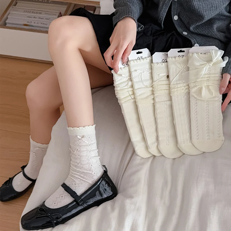 韩版袜子女纯色镂空jk袜子蝴蝶结ins饰品袜奶油色木耳边堆堆袜女