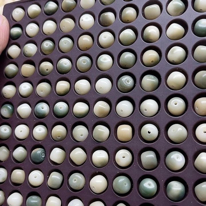 白玉菩提吊坠瑕疵10-9飘花桶珠110颗