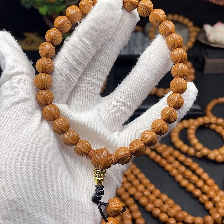 不***。桃核吊坠秦岭龙纹桃核