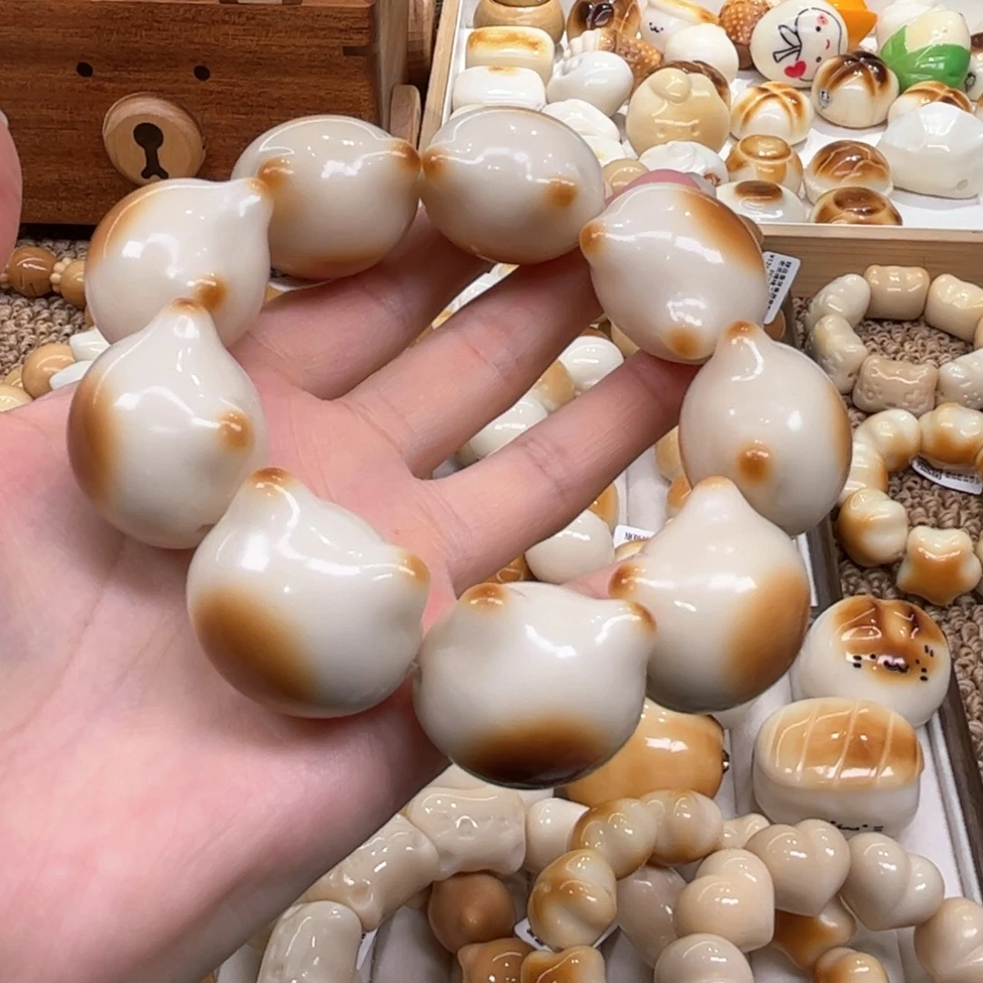 手串菩提根/象牙果9.24.39象牙果碳烤猫头瑕