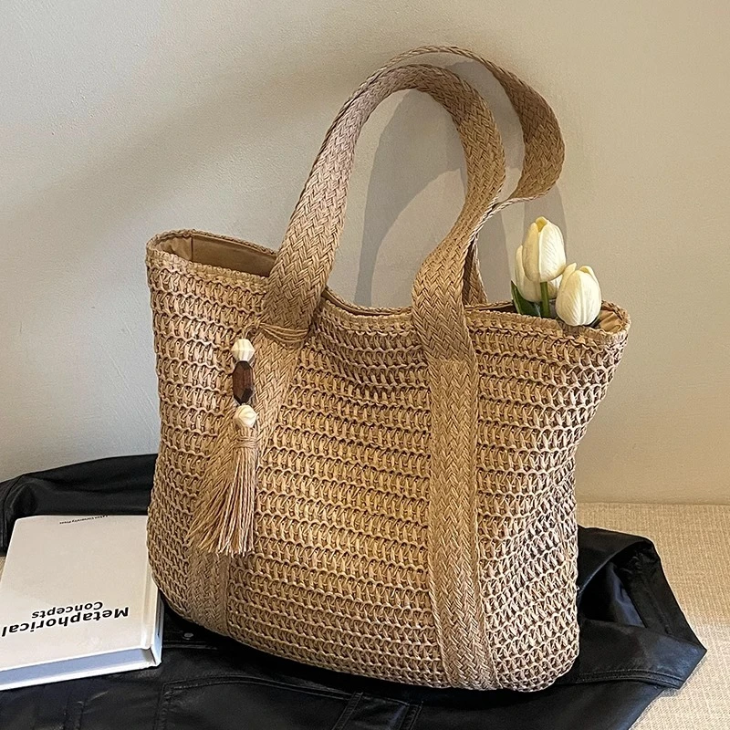夏日慵懒风草编包女2025新款百搭大容量通勤托特包时尚洋气编织包