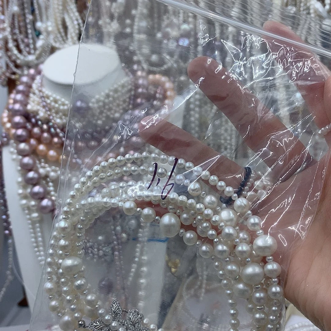 妮***妮淡水珍珠银S925镶嵌耳饰