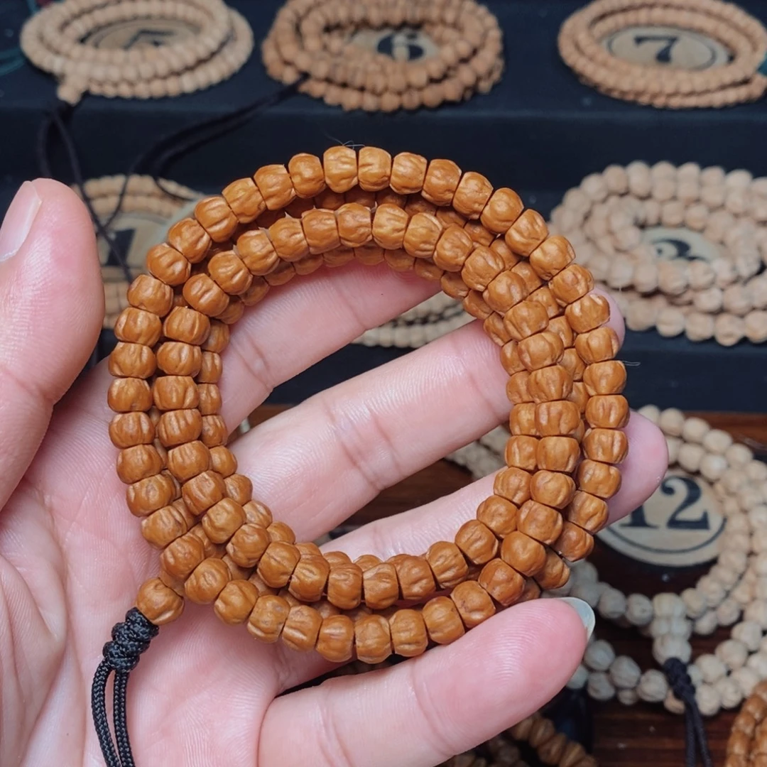 十***孩手串柏香籽/百香籽