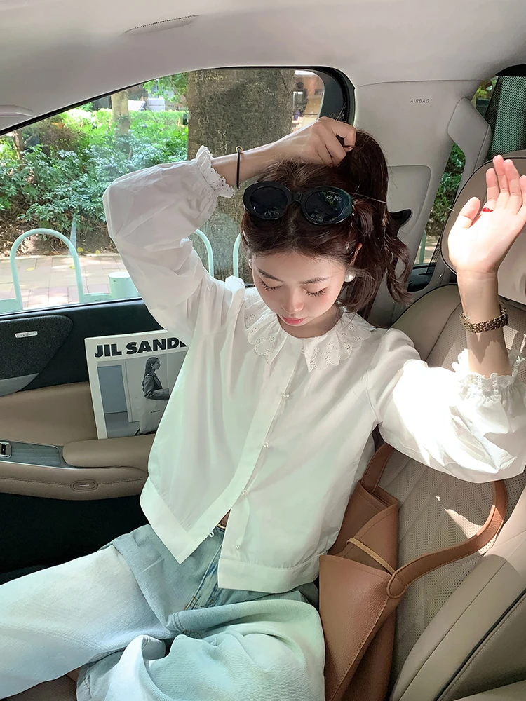 日系文艺风复古白色娃娃领荷叶边长袖衬衫女早秋气质通勤外穿衬衣