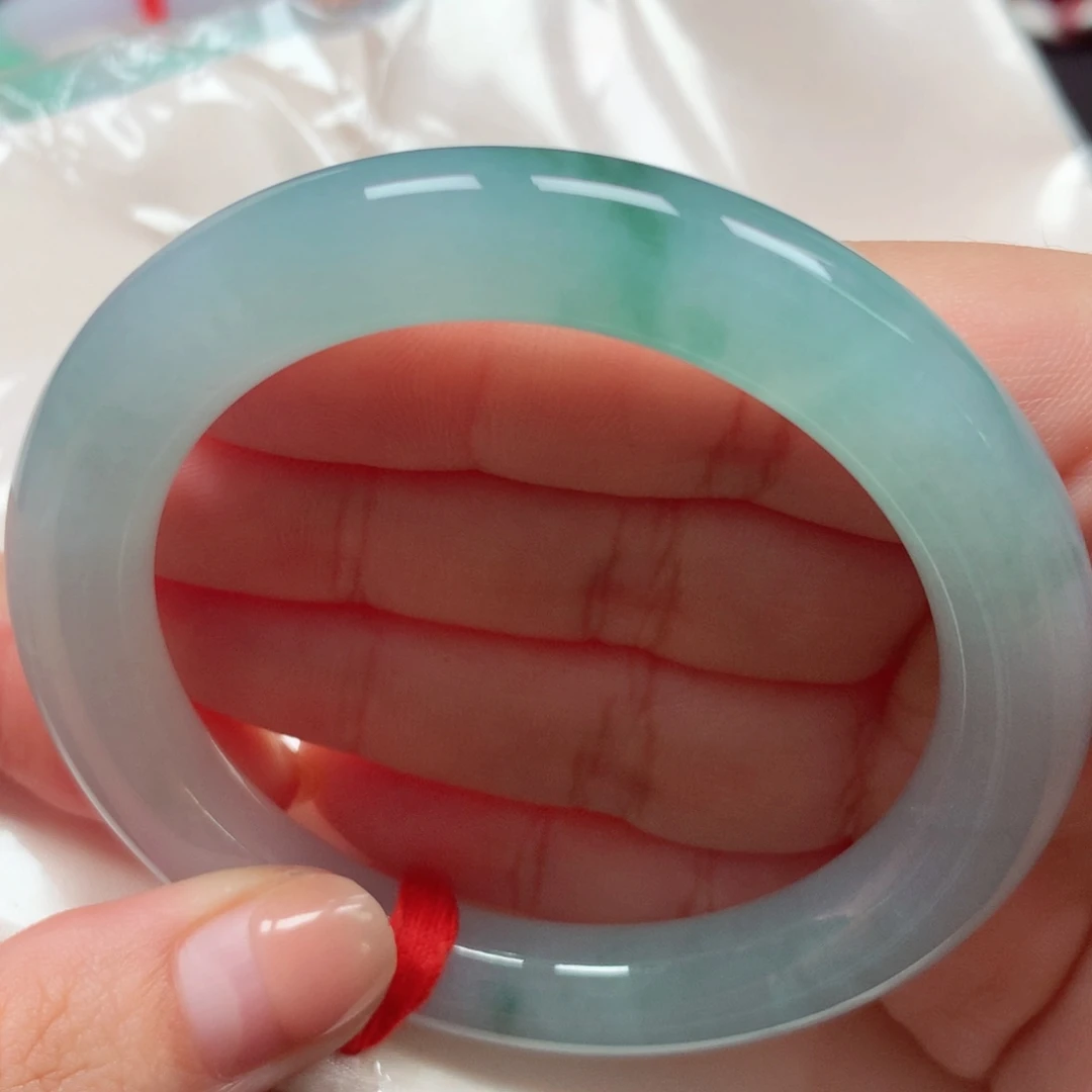 翡翠未镶嵌手镯（圆镯）65冰胶海蓝之谜