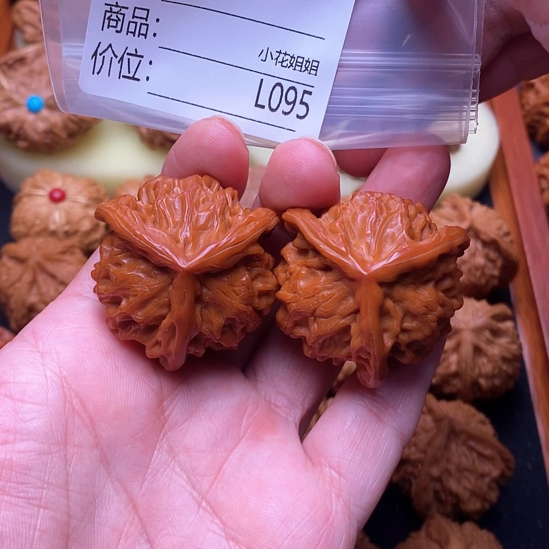 归***時桃核把件40精品红皮三棱