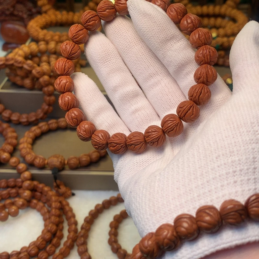 桃核吊坠李*峰秦岭龙纹