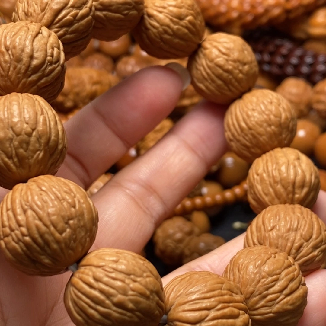 等***.猴头核桃手串猴头