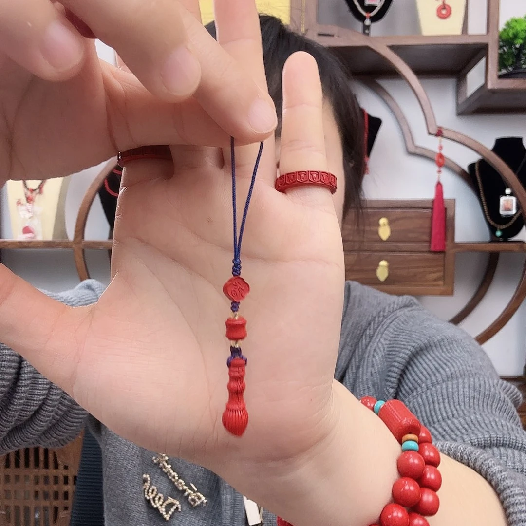 天然辰砂挂件、书包手机