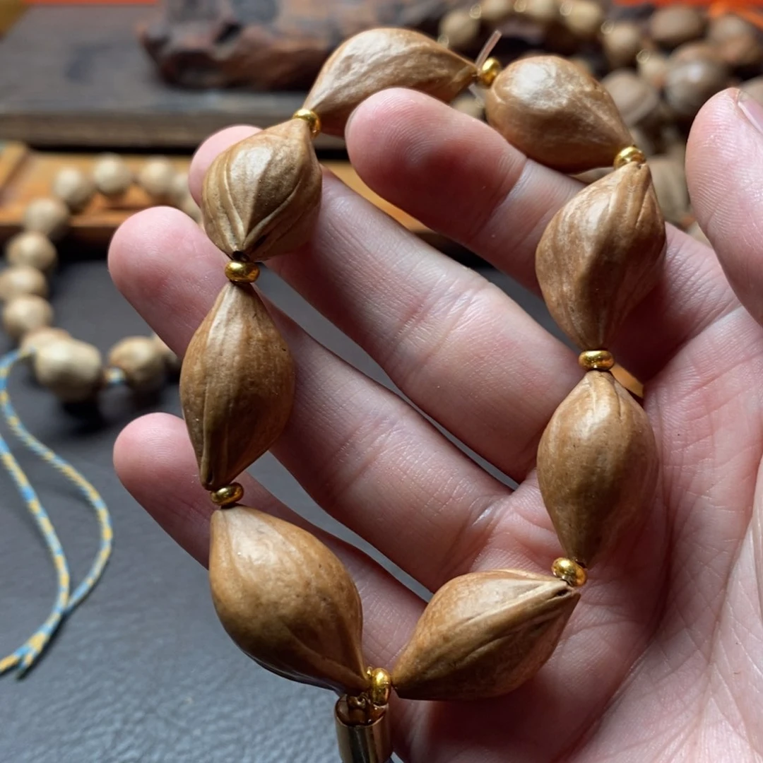 郑***波橄榄核吊坠橄榄核