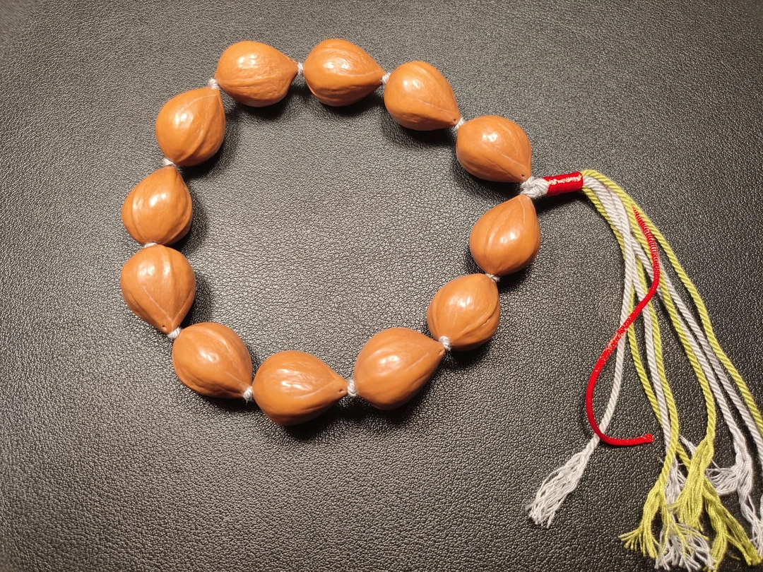 橄榄核原皮抛光素串无雕刻手持把玩佳品