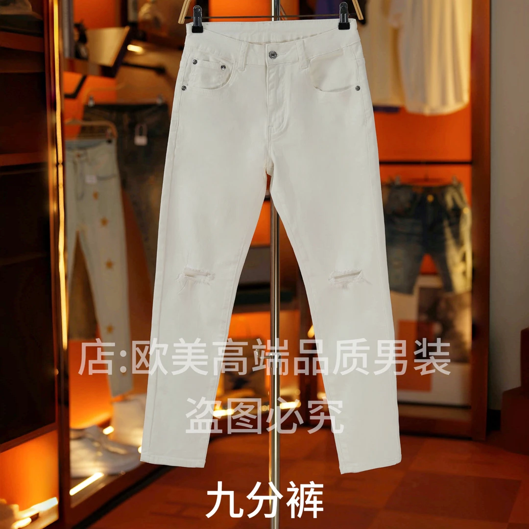 九分裤男士秋冬新款原创高端欧货白色破洞露肉牛仔裤修身小脚弹力
