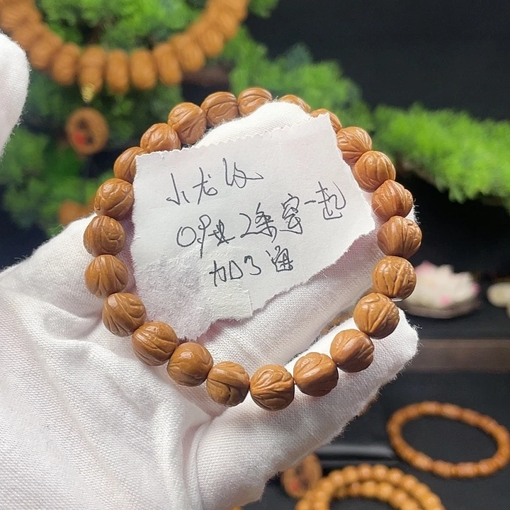 于***炀桃核吊坠秦岭龙纹桃核