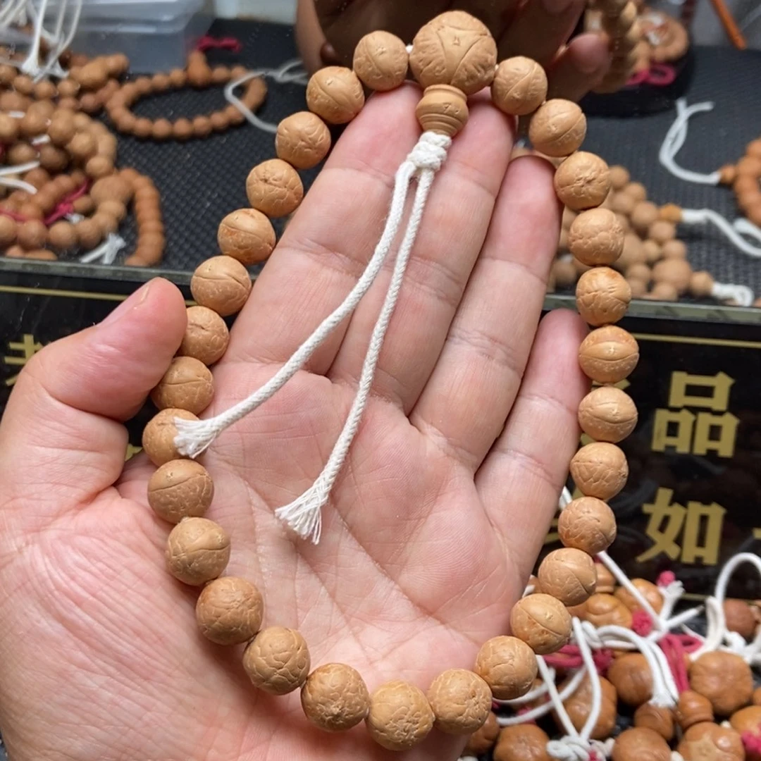 凤眼菩提吊坠12+精品手持