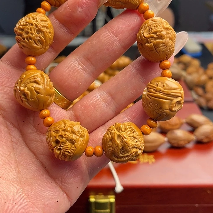 橄榄核吊坠依**剧橄榄核