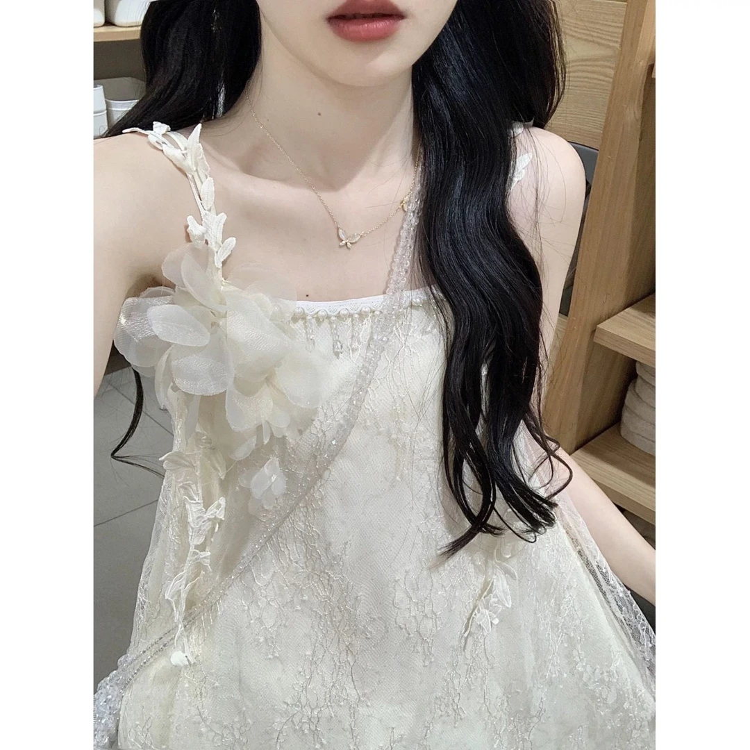 法式纯欲立体花朵流苏吊带连衣裙女夏季新款海边度假风不规则裙子