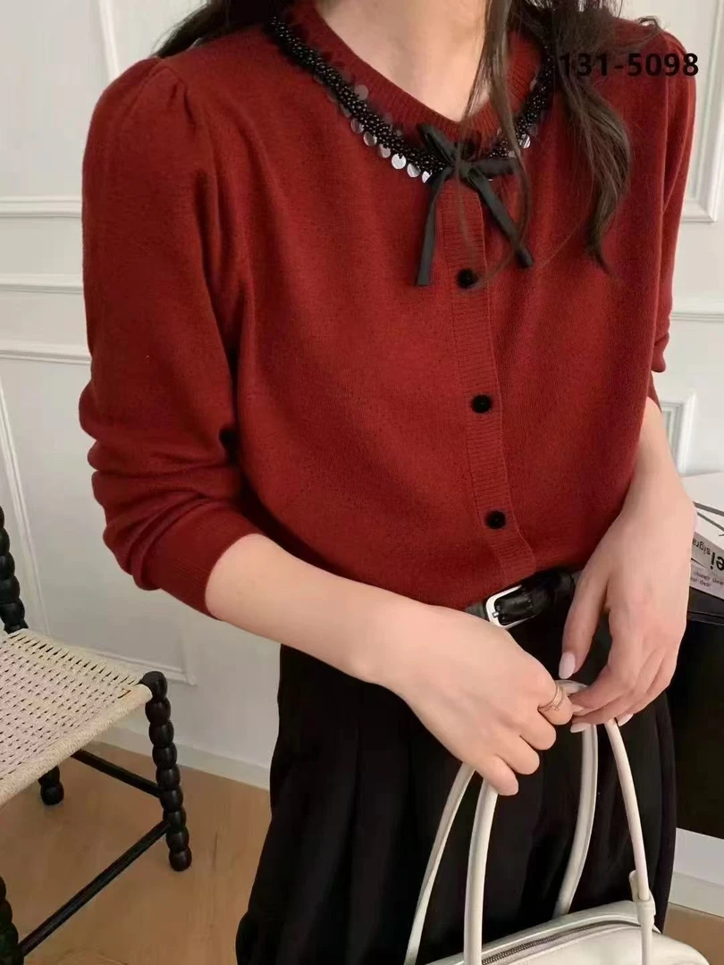 欧洲站乌衣轩春季新款时尚套头针织衫女