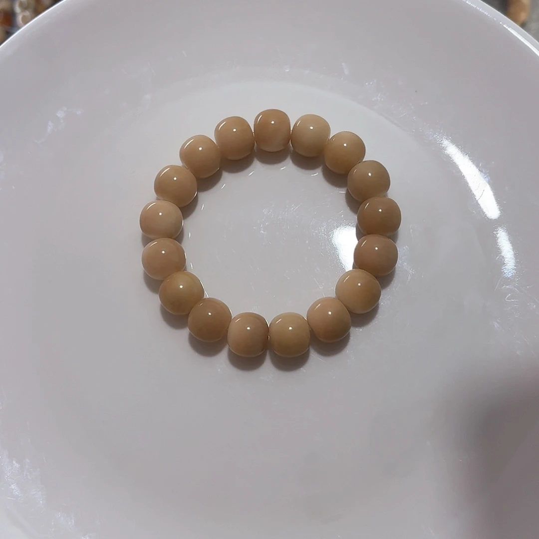 菩提根/象牙果手串猪****?