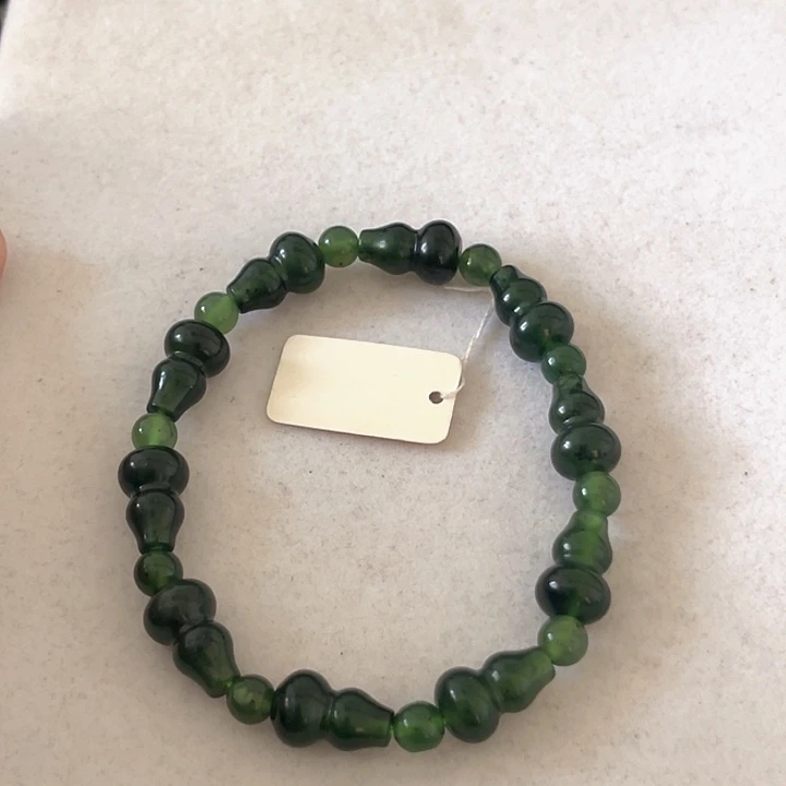 安***馆蛇纹石玉未镶嵌颈饰