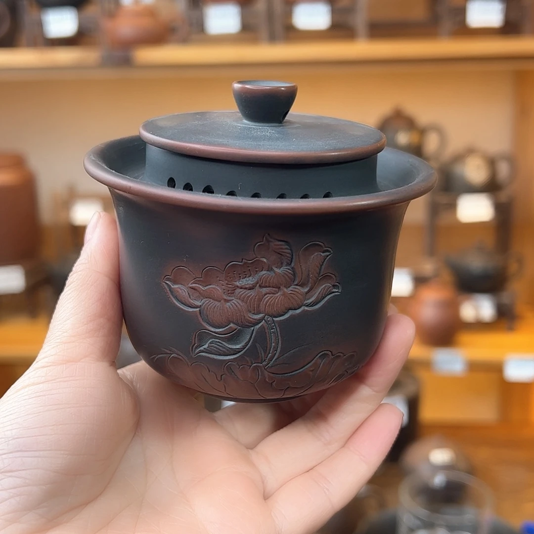 时****在坭兴陶荷花浮雕手抓壶