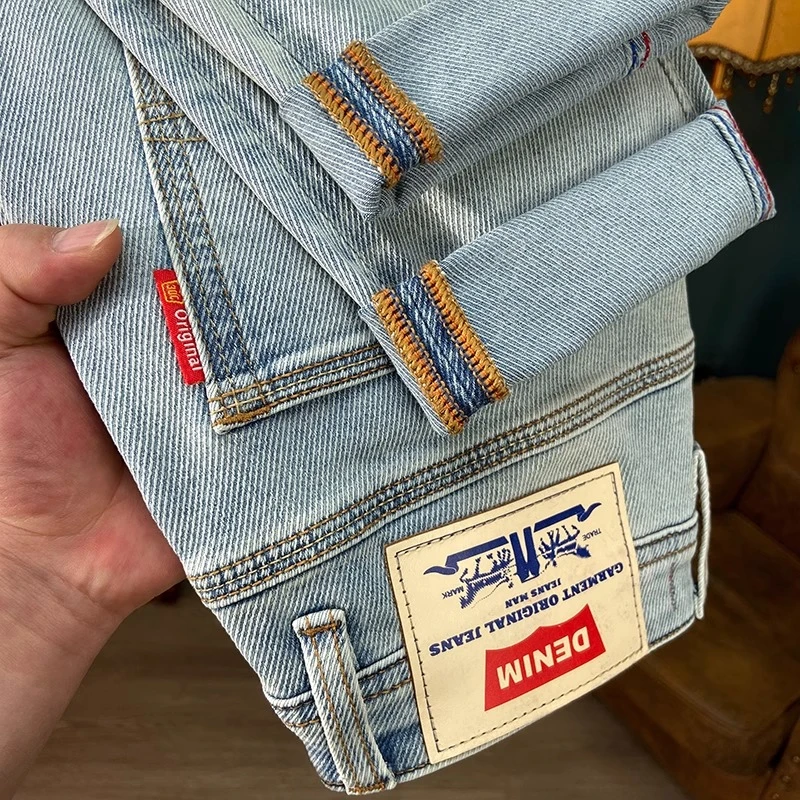 夏季薄款九分牛仔裤男款浅蓝色高端美式时尚潮流弹力修身小脚长裤