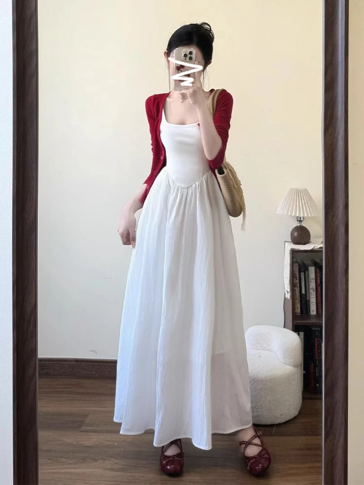 秋季流行气质穿搭白色吊带连衣裙子2025新款收腰长裙一整套装女