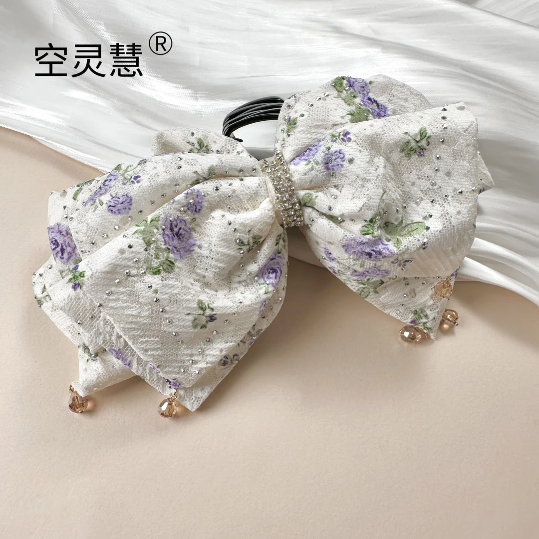 0652   紫色超仙蝴蝶结抓夹