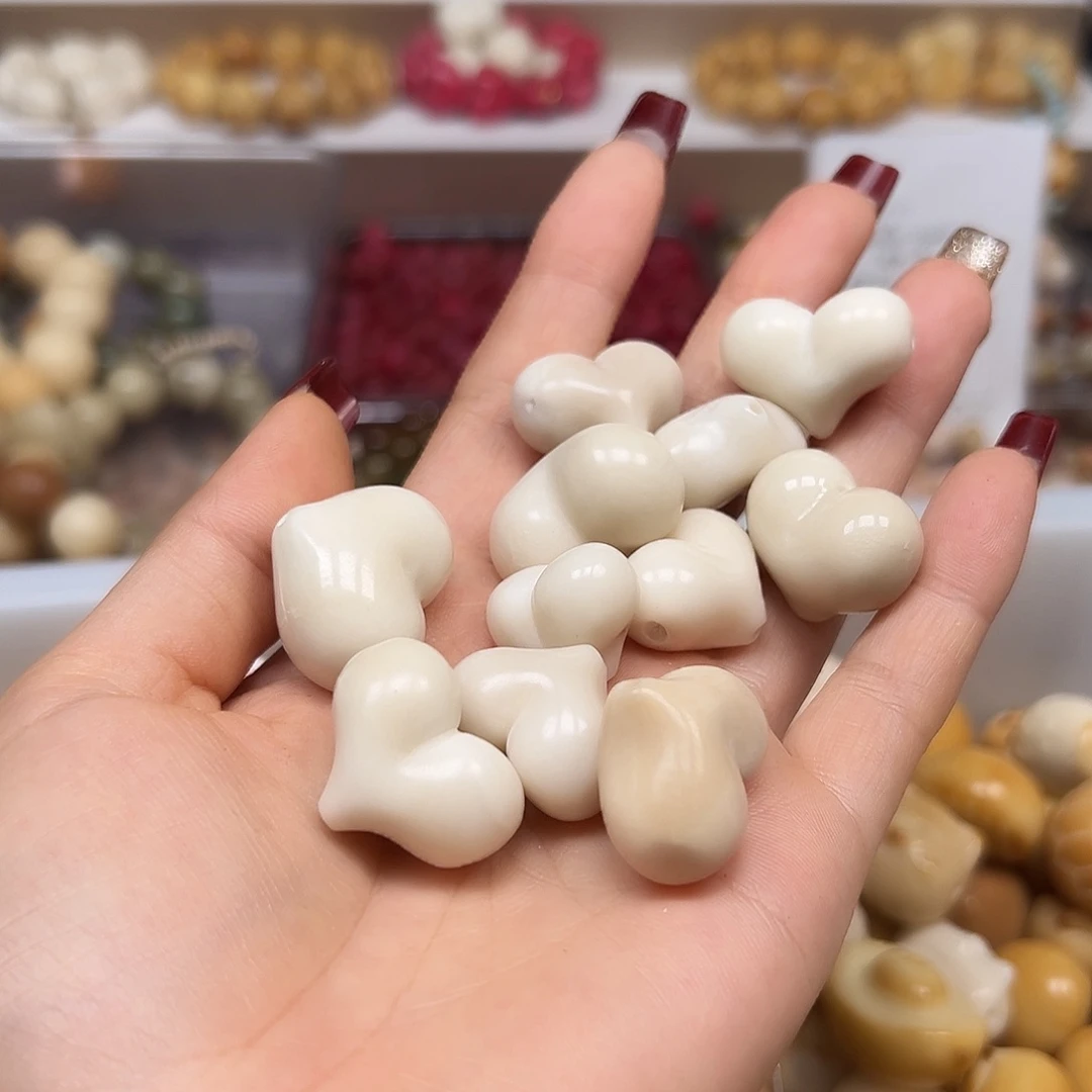 手串菩提根/象牙果瑕疵白爱心10颗有裂