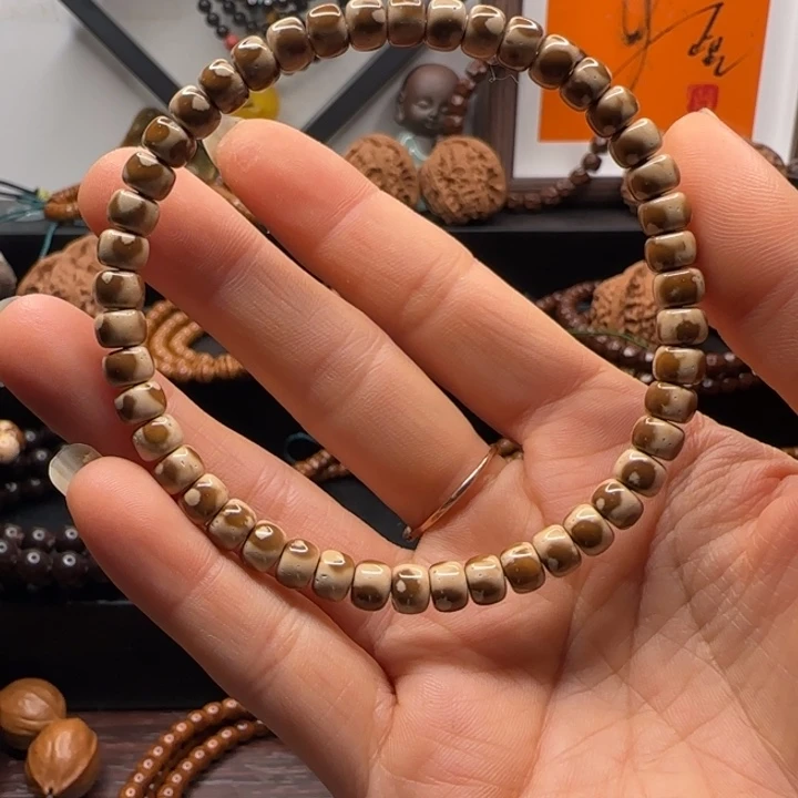 手串紫金鼠6*4.5纯肉短轴花皮手串