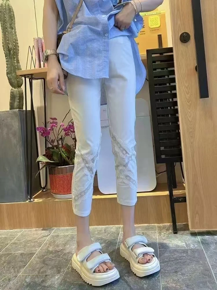 欧货拼接蕾丝打底裤女松紧腰弹力显瘦交叉镂空七分裤夏新款纸皮裤