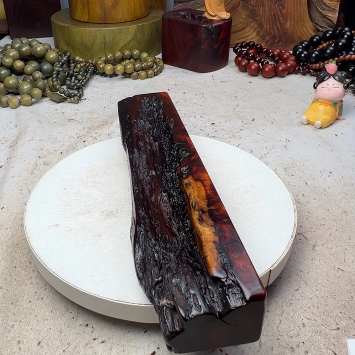 敏***艳木赞比亚血檀底座摆件