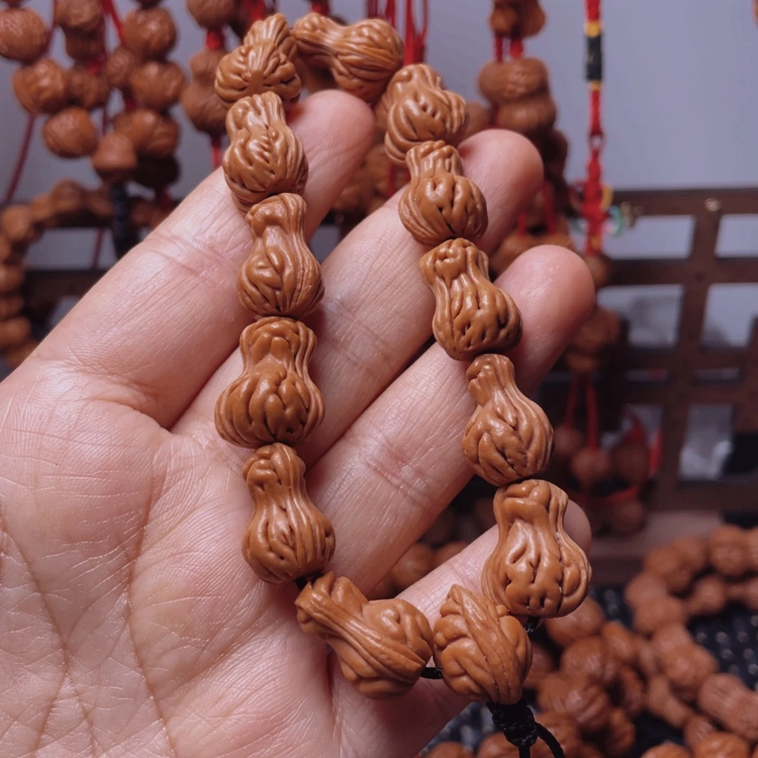 木质类龙纹桃枭手串