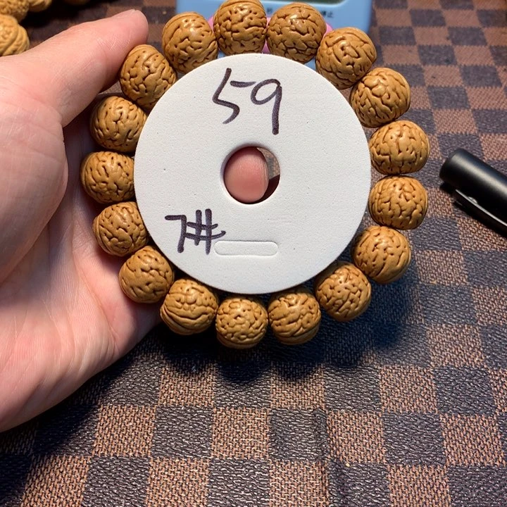 桃核手串辽**人7号链接，