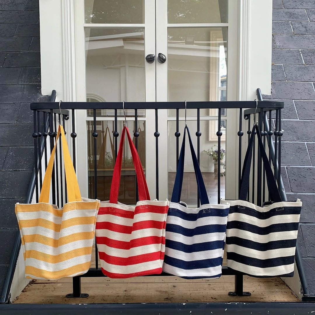 竹笋喵喵 韩系ins条纹单肩帆布包女2025新款通勤时尚腋下包购物袋