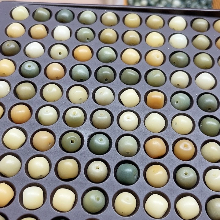 白玉菩提吊坠微瑕11糖果桶100卡灯牌宠200