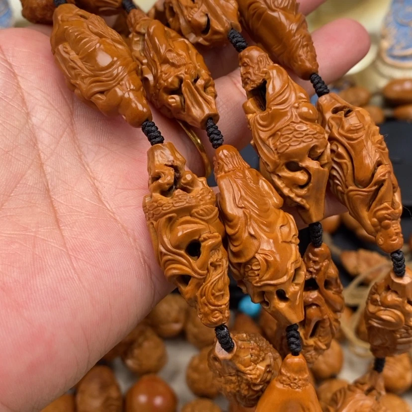 【闪购商品】橄榄核吊坠鱼****?橄榄手工雕刻工艺