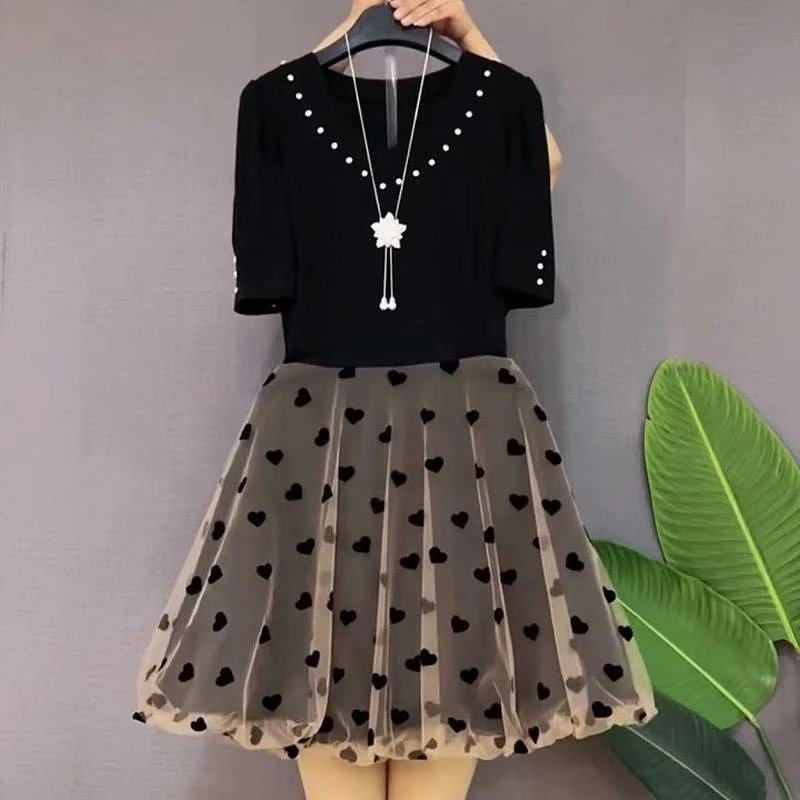 大码女装夏季连衣裙女2025新款轻熟风潮流设计感拼接网纱裙子